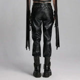 Back view of Mordanthe Trousers, showcasing sleek black faux leather with unique detailing and edgy style.